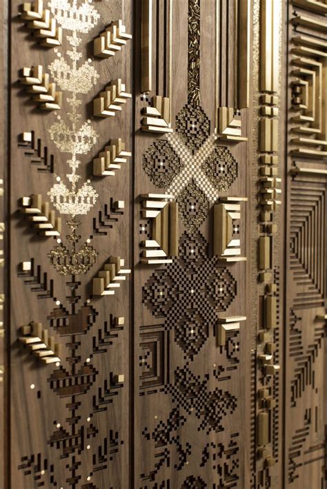 An Intricately Designed Wooden Door Is Shown