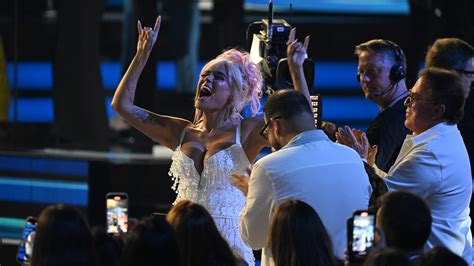 Karol G accepts Spirit of Hope award at Billboard Latin Music Awards