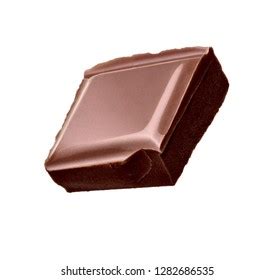 Close Chocolate Pieces Stack Falling On Stock Photo 1673526577