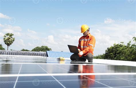 Engineer Inspecting Solar Panel Installation On House Roof Solar Panel Maintenance Inspector