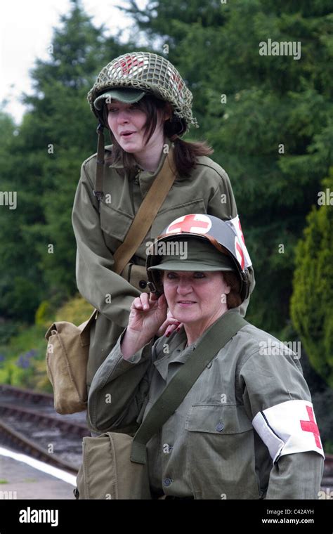 A World War Two Battle Re Enactment With Medics Assisting A 58 Off