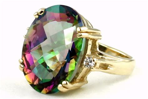 R269 15ct Mystic Fire Topaz Set In A Gold Ring W Two Cz Accents