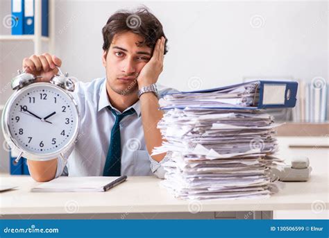 Overloaded Busy Businessman Having Lunch At Work Stock Image