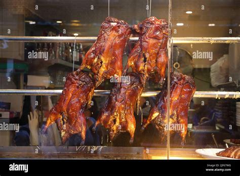 Peking Roasted Duck Ready In A Window Of Generic Chinatown Restaurant