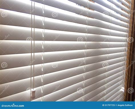 White Wood window blinds stock image. Image of interior - 51797725