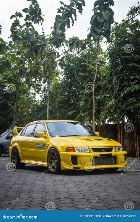 Modified Yellow Mitsubishi Lancer Evolution V In Jdm Run Car Meet