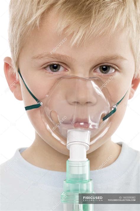 Boy Using Nebulizer To Treat Asthma — Breathing Asthmatic Stock