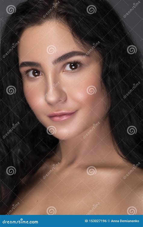 Close Up Portrait Of Brunette Woman With Flawless Clean Skin Natural Neutral Make Up Stock