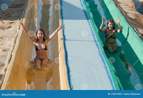 Women In Bikini On Swimming Pool Water Slide Stock Photo Image Of