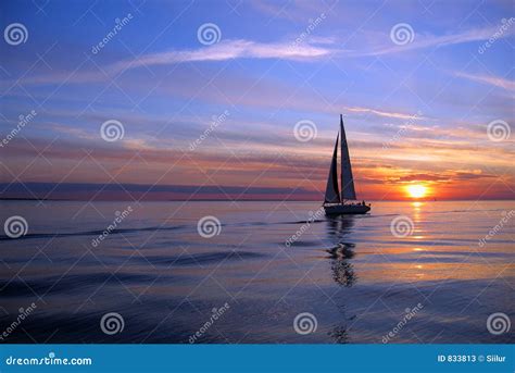 Yacht sailing at sunset stock image. Image of leisure, calm - 833813