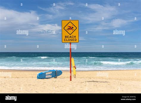 A Beach Closed Sign And Kracka Lifeguard Board At Maroubra Beach