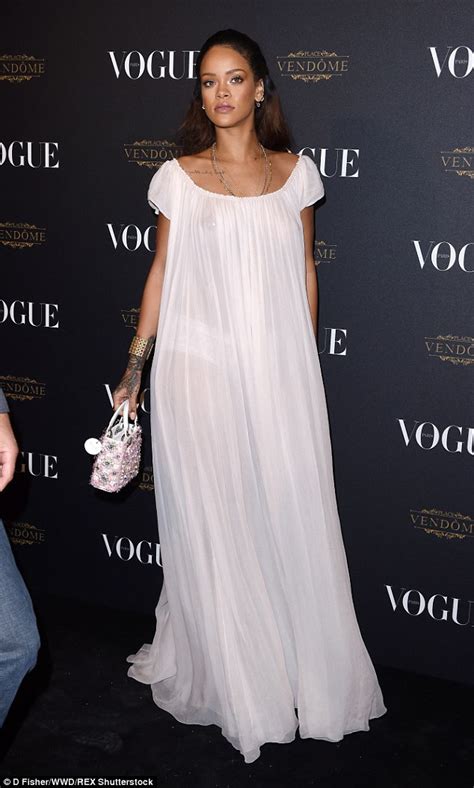 Rihanna Goes Braless In Sheer Dress At Vogue S Paris Fashion Week Party