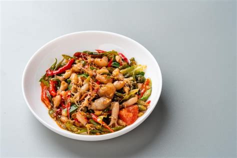 Premium Photo Spicy Stir Fried Squid Or Tumis Cumi Pedas Is