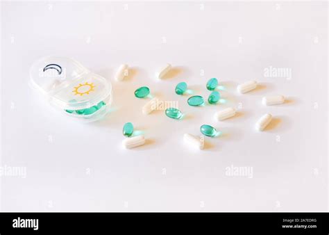 Pills Case And Capsules Background Stock Photo Alamy