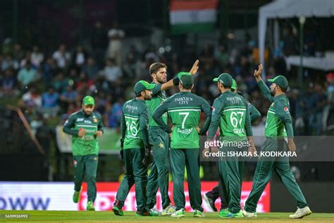 Pakistans Shaheen Shah Afridi Celebrates With Teammates After Taking