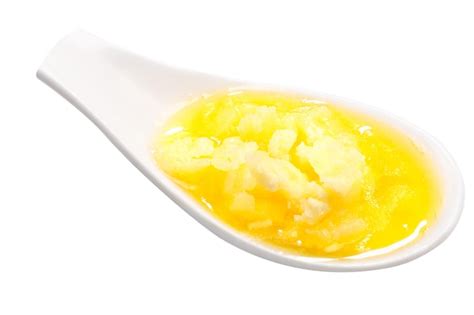 Cucharada De Mantequilla Derretida Ghee Foto Premium