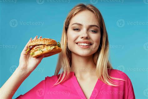 Cheerful Blonde Fast Food Snack Emotion Blue Background Stock Photo At Vecteezy
