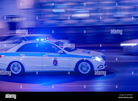 MOSCOW, RUSSIA - MARCH 12, 2018: The blurry silhouette of the speeding ...