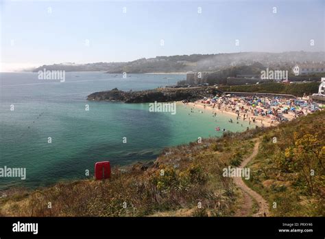 St Ives Is A Seaside Town And Port In Cornwall Surrounded By Many