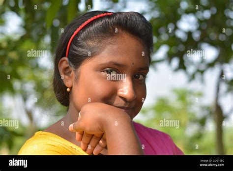 Close Up Of An Indian Bengali Teenage Girl Wearing Yellow Color Salwar