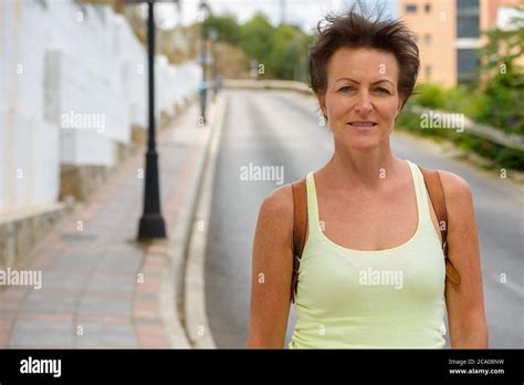 Mature Beautiful Tourist Woman In The Streets Outdoors Stock Photo Alamy