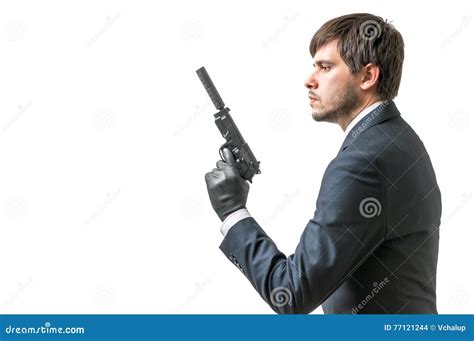 Secret Agent Or Spy Holds Pistol With Silincer In Hand Isolated On