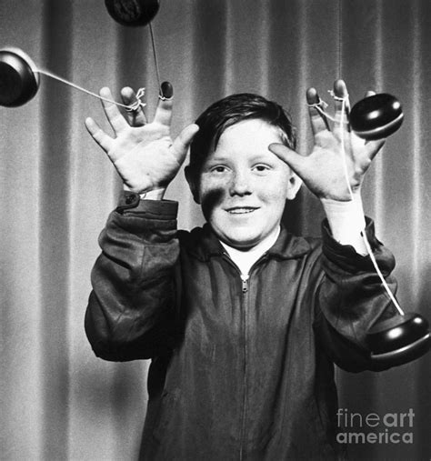 Boy Doing Yo-yo Tricks Photograph by Bettmann - Fine Art America