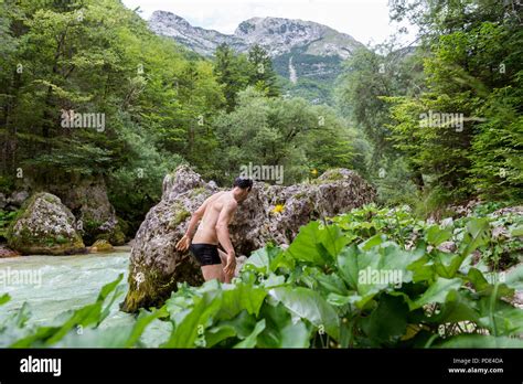 A man swimming in the river of beautiful nature Stock Photo - Alamy