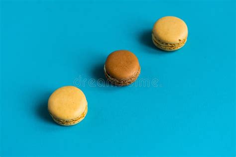 Colorful Cake Macaron Or Macaroon On Blue Background Flat Lay Top