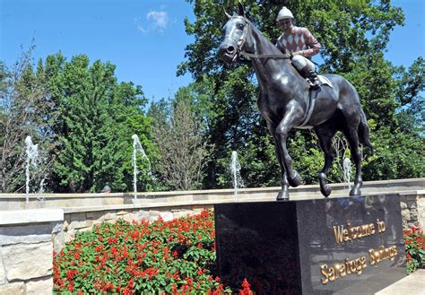 Two charged in horse statue damage