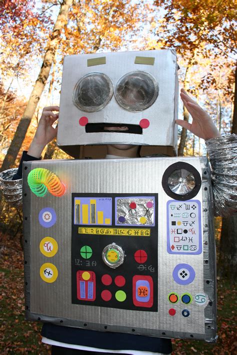 DYI Space Robot Costume. This was made from boxes, paper, tin foil etc ...