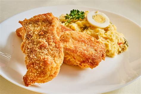 Fried Carp with Potato Salad Stock Photo - Image of fried, mayonnaise: 264908882