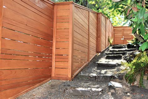 Modern Fence Storage Area Hillside Landscape Path And Planting Beds