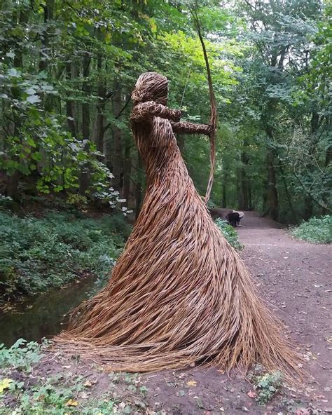 Artist Fills Forest With Life Size Sculptures Made From Woven Rods Of