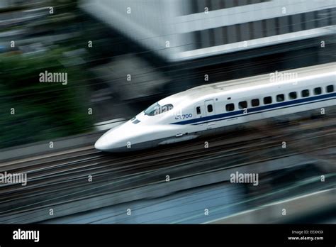 Speeding Shinkansen train Stock Photo - Alamy