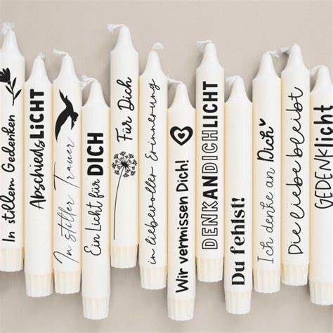 Several White Pens With Black Writing On Them