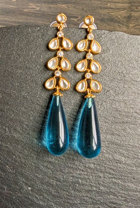 Long Kundan Dangle Earrings With Blue Dangle Gold Kundan Jadau