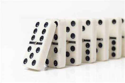 Domino Effect Stock Photos, Pictures & Royalty-Free Images - iStock