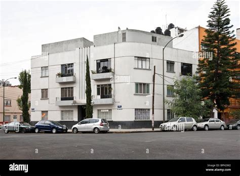 Art Deco White Stucco Apartment Building With Curved Corner Cypress