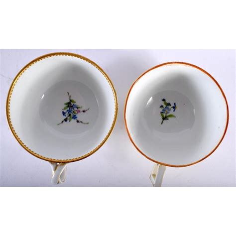 An Th Century German Meissen Porcelain Cup And Saucer Together With