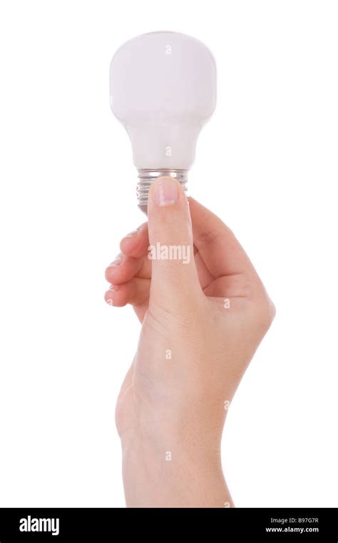 Hand Holding An Incandescent Light Bulb Isolated On White Stock Photo