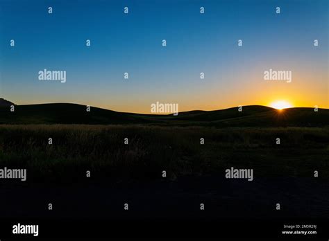 Beautiful sunset over rolling farm fields; Palouse region; Washington ...