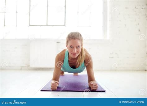 Woman Doing Plank Exercises Stock Photo Image Of Camera Yoga 142346916