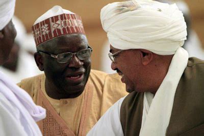 UNAMID head Ibrahim Gambari (Nigeria) chatting with indicted ...