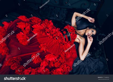 Brunette Woman Red Dress On Bed Stock Photo 171688262 Shutterstock