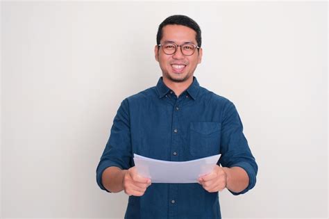 Premium Photo Asian Man Smiling Happy While Giving A Doucment Folder