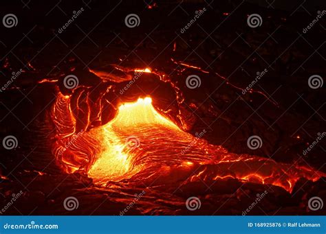 Hot Magma Emerges From A Crack In The Earth Stock Photo Image Of