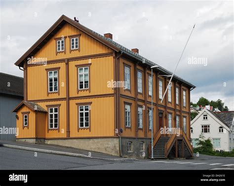 Traditional house in the modern street of Tromso Stock Photo - Alamy