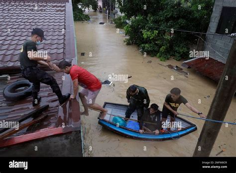 Police Rescue Residents As Floods Continue To Rise In Marikina