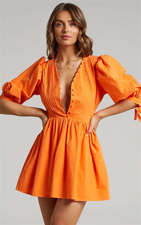 Show Up And Show Off In Our Zandra Puff Sleeve Dress This Pretty Mini